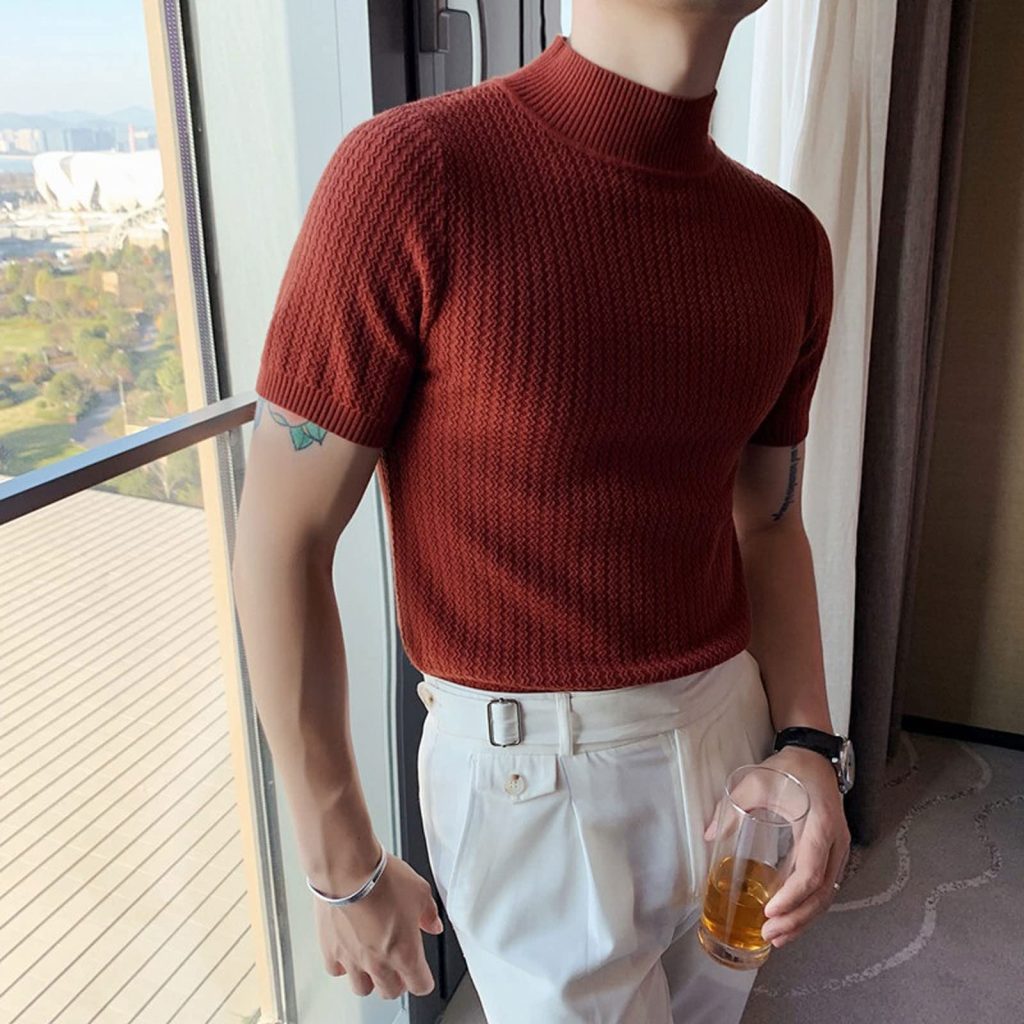 Short sweaters, or cropped sweaters, are a trendy and somewhat daring piece in men's fashion. They can be a bold statement or a subtle addition to an outfit